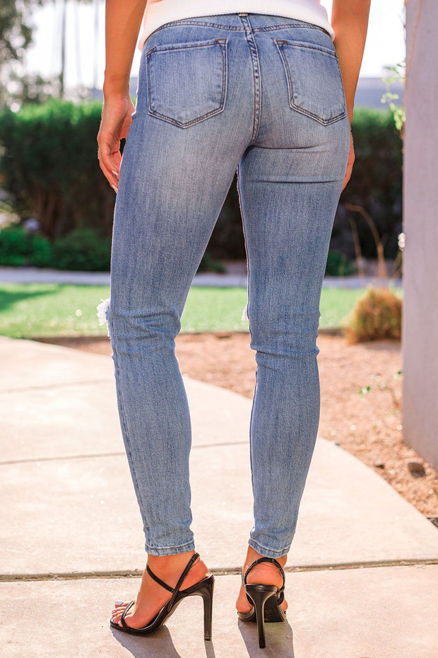 Distressed Medium Wash Denim Skinny Jeans
